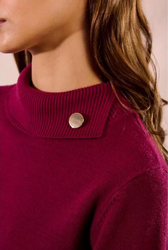Maglione dolcevita con bottoni